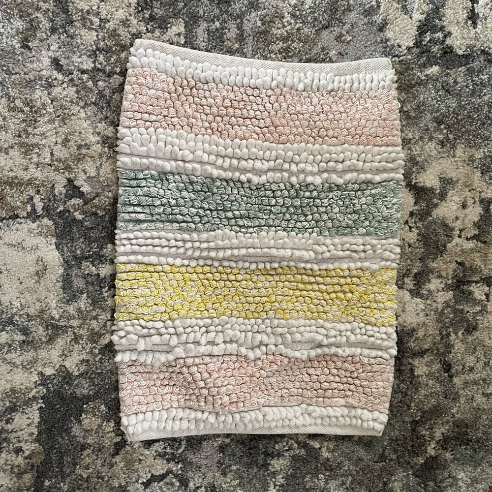 Small white bathroom rug